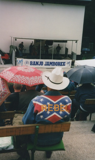 Photo 2  -  “Rebel” in the audience at the 2003 Banjo Jamboree bluegrass festival, the oldest event of its kind in Europe, first held in 1972.  Photo by the author.